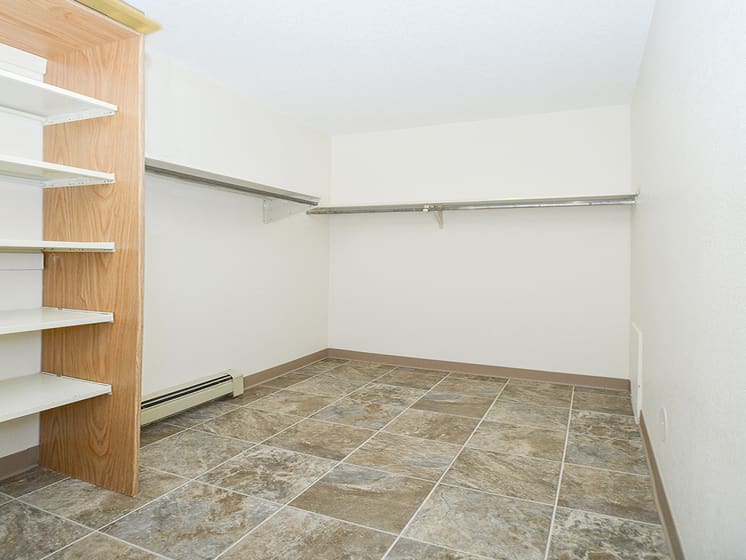Spacious Walk-In Closet with Built-In Shelving