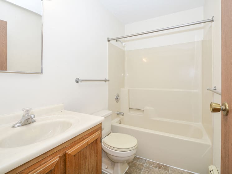 Bathroom with Vanity and Tile Style Flooring