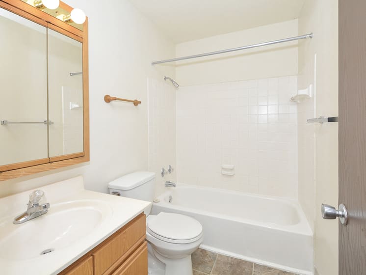 Full Sized Bathroom with Tile Style Flooring and Shower with Tub