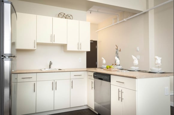 Kitchen and Dining Area at 300 Tache Apartment, Winnipeg, MB.
