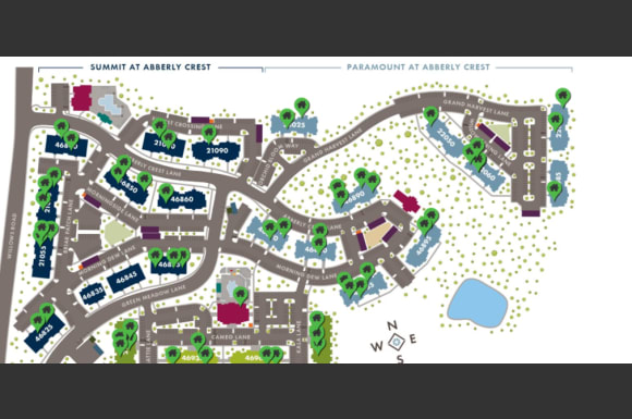 a map of a parking lot with a road and trees