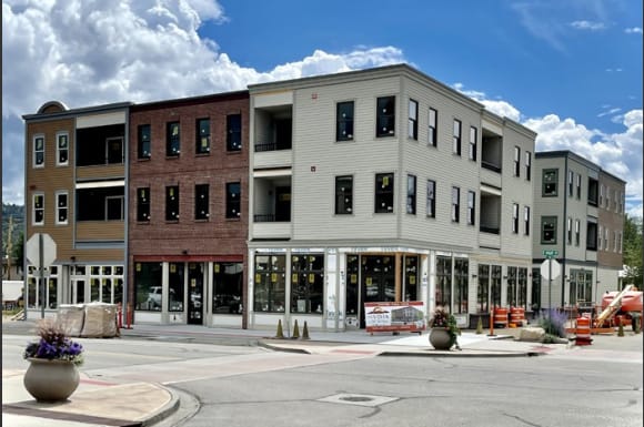 a building on the corner of a city street