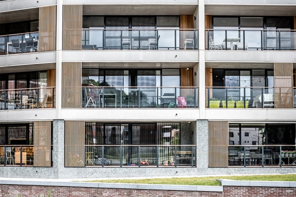 a view of the facade of an apartment building
