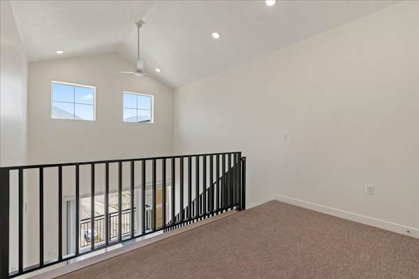 Room with black railing at Solhavn Apartments, American Fork
