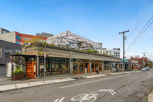 Street view with bike lane at AVIA on Pike Street, Seattle, 98101