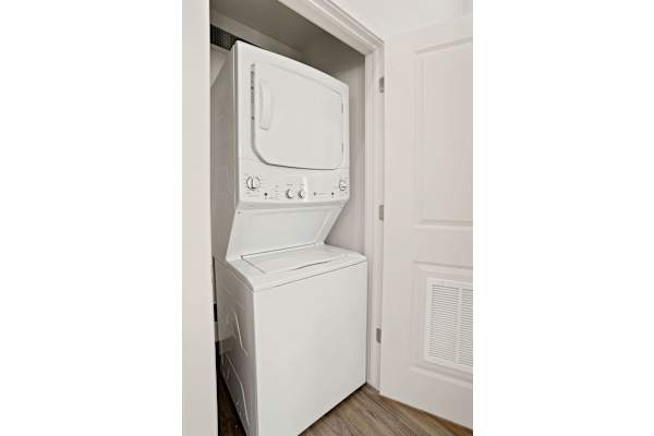 A white dishwasher is installed in a kitchen. at 605 Place Student Housing & Co-Living, Utah, 84770