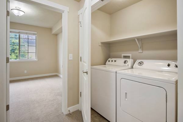A laundry room with a washer and dryer. at Siena Villas Apartments, Orem, UT, 84097