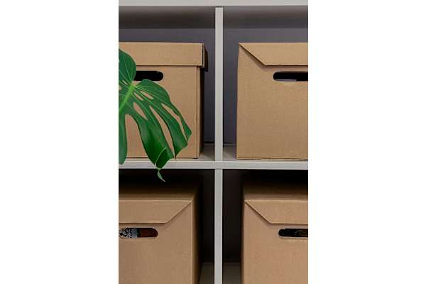 Four cardboard boxes at Alante Homes at Spring Run, Idaho