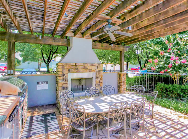 Outdoor fireplace and BBQ Grills at The Remington at Memorial in Tulsa, OK, For Rent. Now leasing 1 and 2 bedroom apartments.