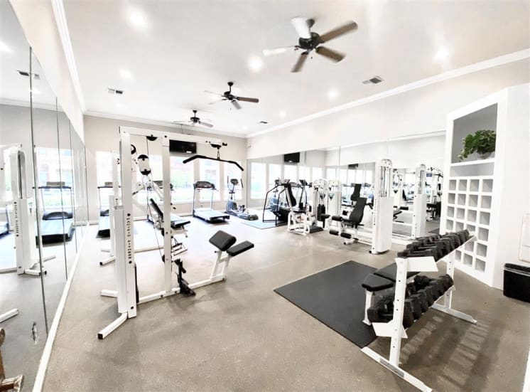 Huge fitness center with cardio and weight training. For Rent, Gates de Provence in North Dallas, TX.