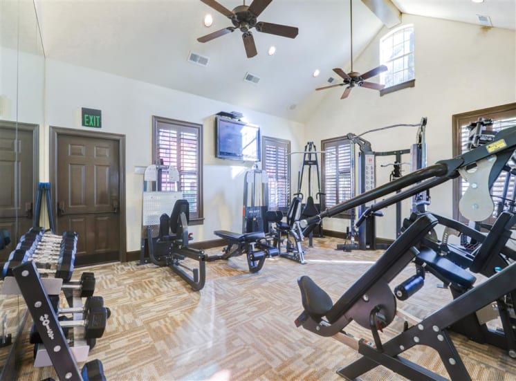 Fully equipped fitness center of Saddle Brook Apartments in North Dallas, TX, For Rent. Now Leasing 1, 2 or 3  bedroom apartments.