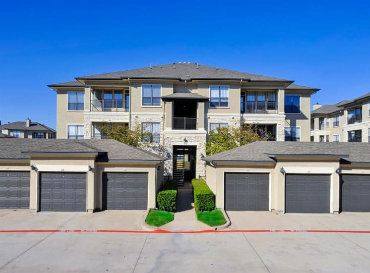Covered garages of Cypress Lake at Stonebriar Apartments in Frisco, TX, For Rent. Now leasing 1, 2 and 3 bedroom apartments.