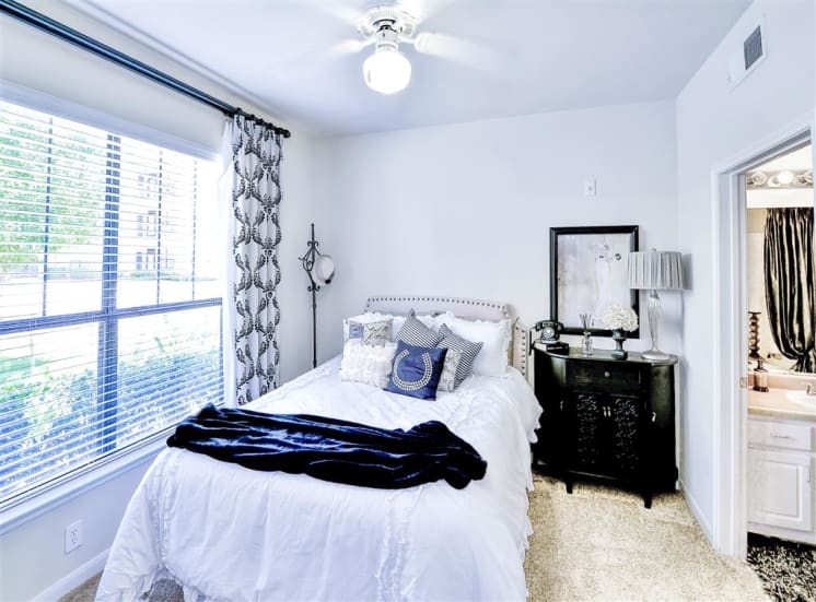 Ceiling fan in bedroom of Cypress Lake at Stonebriar Apartments in Frisco, TX, For Rent. Now leasing 1, 2 and 3 bedroom apartments.
