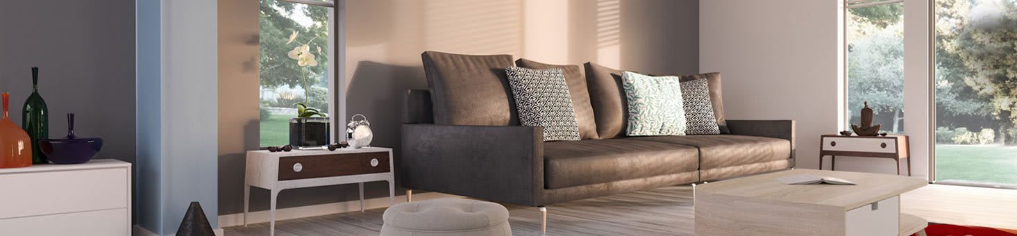 A modern living room with a brown couch and a white side table.