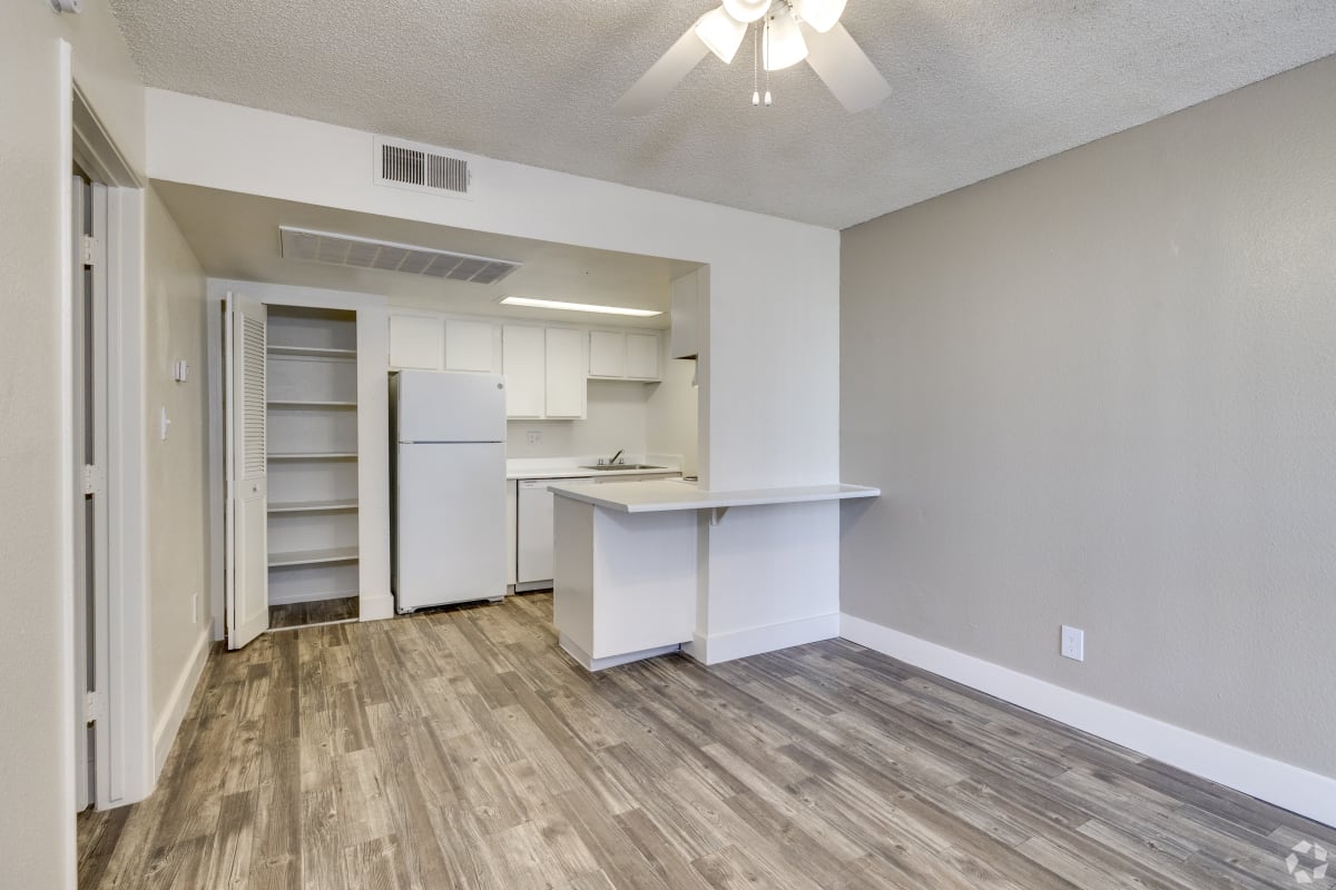 Living area opening into the kitchen at Sagewood Apartments