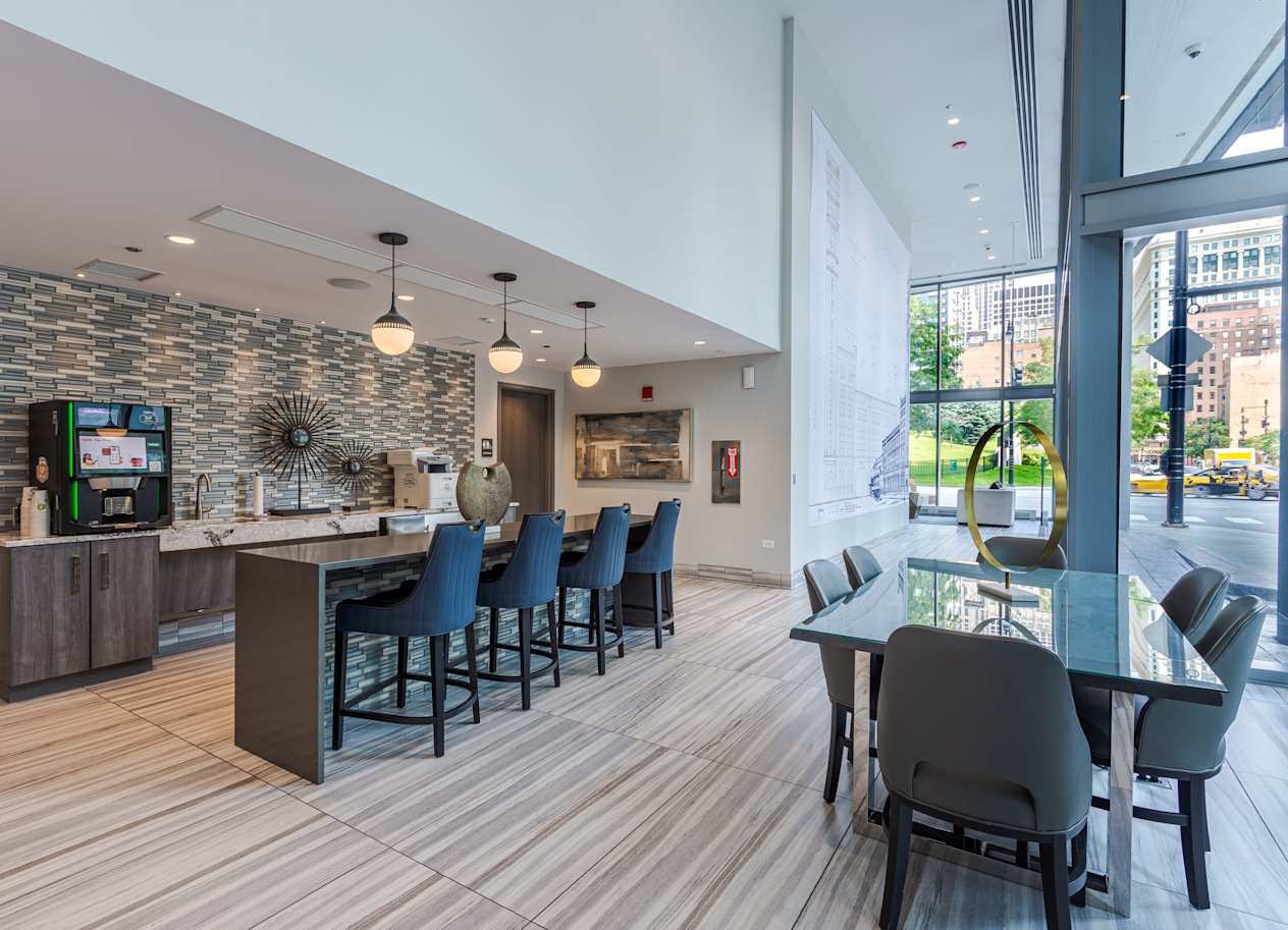 Community Kitchen with Seating at The Grand Central Apartments in Chicago, IL 60607