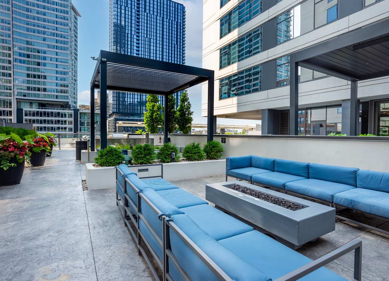 Outdoor Patio Space with Fire Pit at The Grand Central Apartments in Chicago, IL 60607