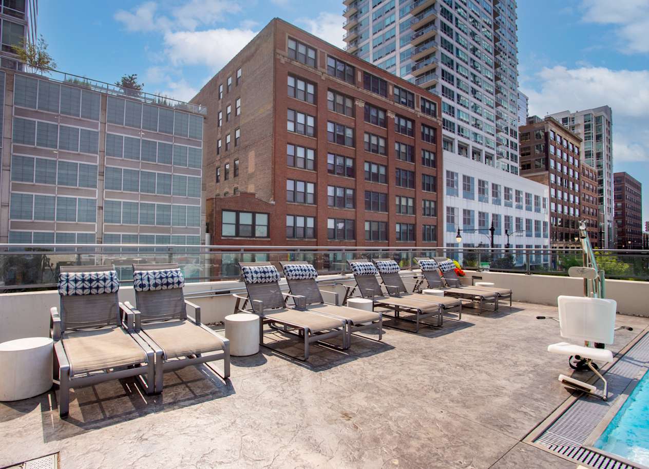 Poolside Lounge Chairs at The Grand Central Apartments in Chicago, IL 60607