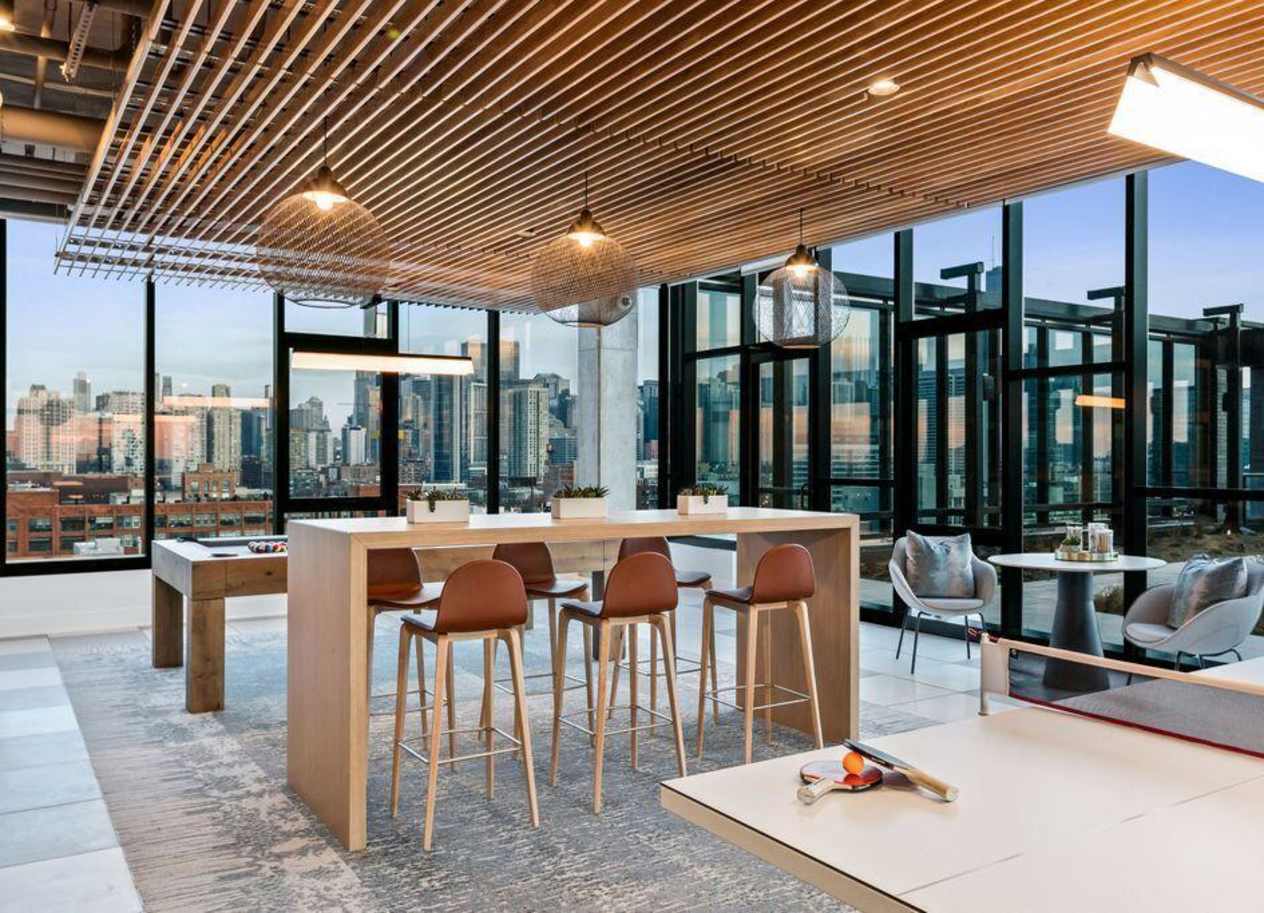 Game room at Avenir River West apartments