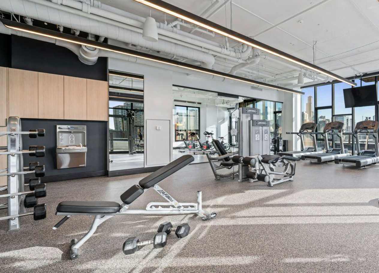 fitness center in River West apartments at Avenir