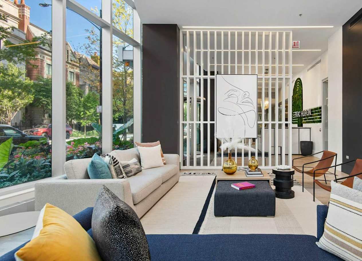 a living room with a couch and a table