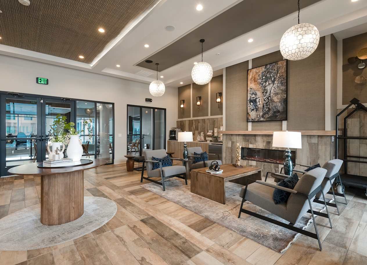 Upscale Lounge with Cozy Fireplace, Soft Seating, and Elegant Decor Touches