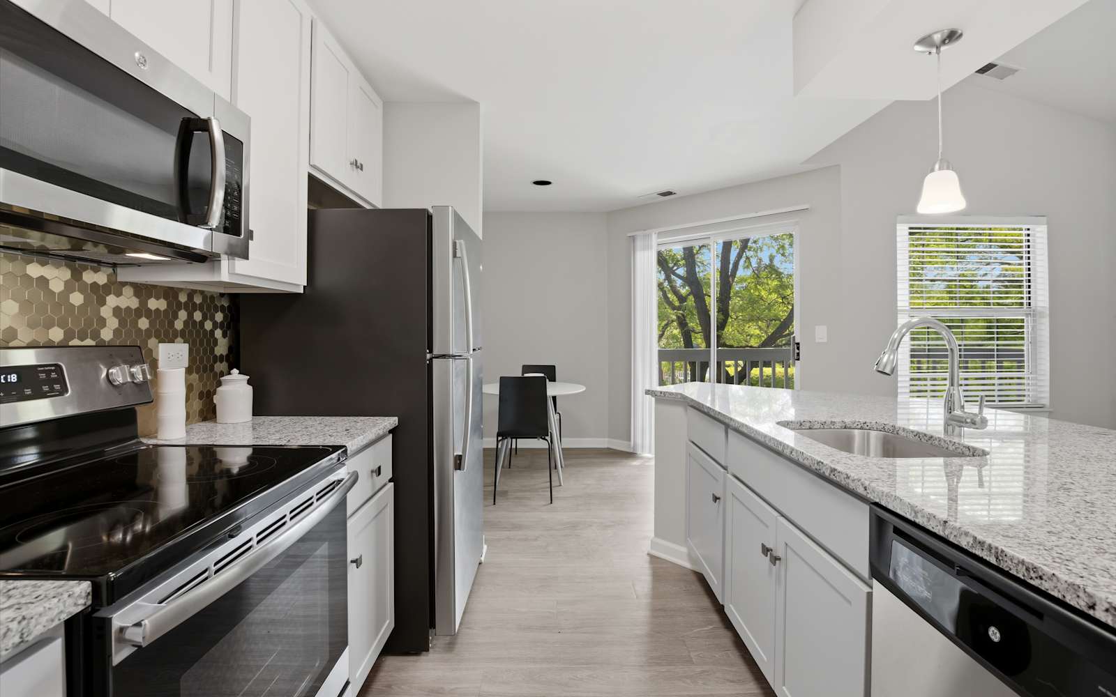 Renovated Forest Pointe apartment kitchen and living space in Lake Bluff