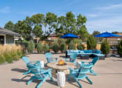 Thumbnail 13 of 27 - Clubhouse Patio with Firepit at Briargate, Colorado Springs, Colorado