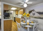 Thumbnail 23 of 27 - Fully Equipped Eat-In Kitchen at The Glen at Briargate, Colorado Springs, CO
