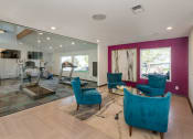 Thumbnail 17 of 27 - Social Lounge Overlooking At Fitness Center at The Glen at Briargate, Colorado Springs, CO