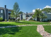 Thumbnail 2 of 27 - Courtyard With Green Space at The Glen at Briargate, Colorado Springs, Colorado
