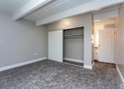 Thumbnail 27 of 27 - A room with a grey carpet and white walls.