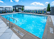 Thumbnail 5 of 37 - Heated rooftop pool with skytop cabanas at 360 State Street, Connecticut, 06510