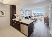 Thumbnail 21 of 37 - Open plan kitchen with black cabinetry, stainless steel appliances & ample storage at 360 State Street, New Haven, 06510