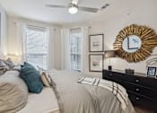 Thumbnail 26 of 39 - spacious bedroom with two windows and ceiling fan at LynnCora, Texas
