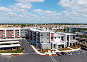 Thumbnail 17 of 18 - Ariel view of the apartment buildings at Amara Luxury Apartments
