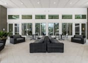 Thumbnail 9 of 79 - resident lounge area with couches and chairs at Mira at Palmer Ranch in Sarasota, FL
