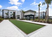 Thumbnail 13 of 79 - outdoor resident game area at Mira at Palmer Ranch in Sarasota