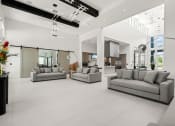 Thumbnail 21 of 79 - a large living room with couches at Mira at Palmer Ranch in Sarasota, FL
