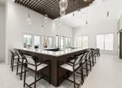 Thumbnail 25 of 79 - resident lounge bar area with counter seating at Mira at Palmer Ranch in Sarasota, FL