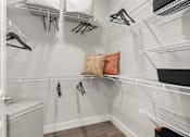 Thumbnail 55 of 79 - a walk in closet with white walls and shelves at Mira at Palmer Ranch, Sarasota, 34238