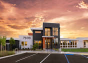 Thumbnail 1 of 25 - leasing office and clubhouse exterior with sunset in the background at Solasta, Sacramento, CA, 95831