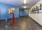 Thumbnail 23 of 23 - Bike Storage room with bike storage and repair stationl at Zeta Luxury Apartments in Sacramento, CA