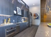Thumbnail 15 of 23 - Demonstration Kitchen at Zeta Luxury Apartments in Sacramento, CA