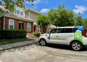 Thumbnail 2 of 10 - A Ticon Car parked outside of Highgate Townhomes.