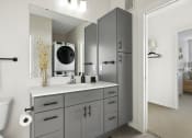 Thumbnail 9 of 29 - a bathroom with gray cabinets and a white countertop