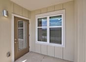 Thumbnail 5 of 35 - A white window with a view of the sky and a fence outside.