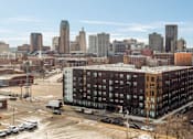 Thumbnail 26 of 26 - Aerial exterior of The Balsam on Broadway and St. Paul skyline