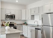 Thumbnail 21 of 35 - Mural-Model Unit Kitchen