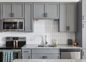Thumbnail 2 of 33 - savor apartments kitchen details with stainless steel appliances